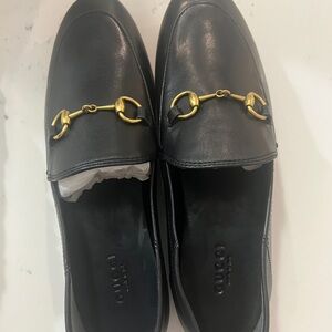 Black Leather Loafers with Gold Horsebit Detail